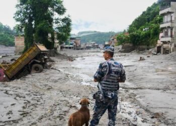 Rescuers retrieve Nepal flood survivors caked in mud | World News