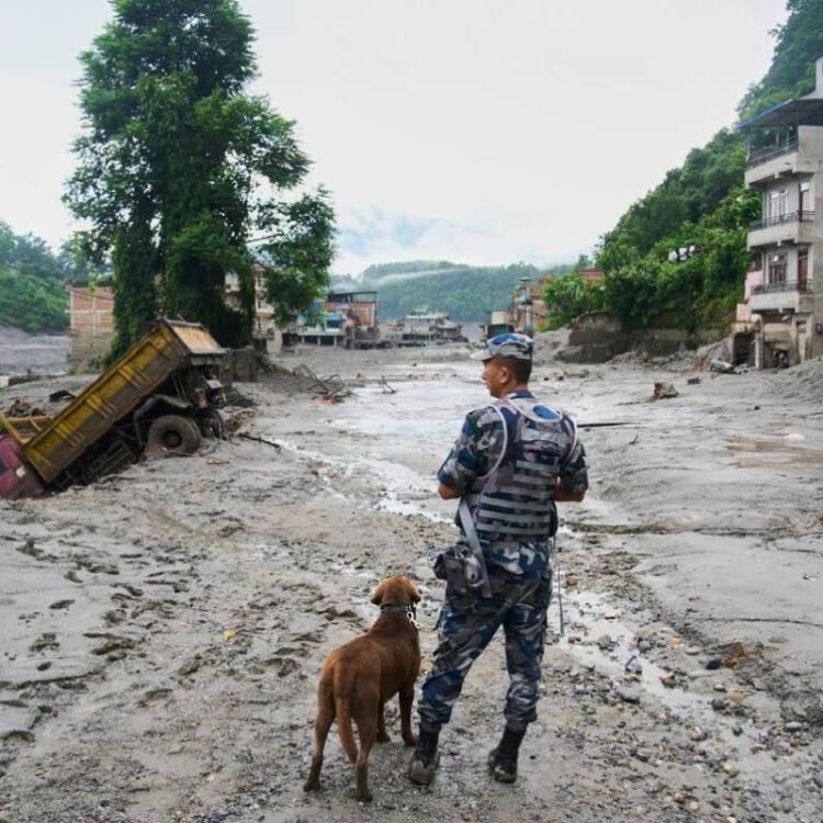 Rescuers retrieve Nepal flood survivors caked in mud | World News