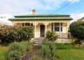 This stunning kauri villa could be yours for $320k; you just need somewhere to put it