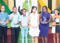 KCCU disburses scholarships and bursaries to 13 students