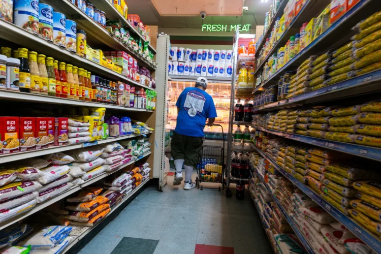 Consumer spending cools as inflation continues to weigh on Americans