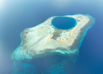 They can start out as underwater volcanoes, take up to 30 million years to form – and are home to about 1 million people