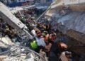 War-damaged Gaza building collapses, killing 16 people seeking shelter inside
