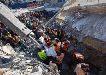 War-damaged Gaza building collapses, killing 16 people seeking shelter inside