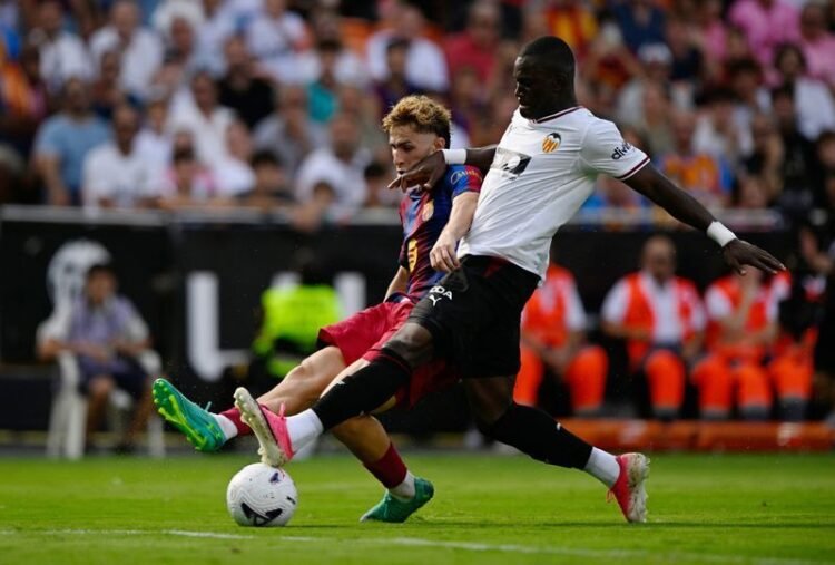 Football: Soccer-Fermin shines for Barcelona in thumping win at Valencia