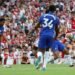 Football: Soccer-Arsenal pass Chelsea test in style with comeback win