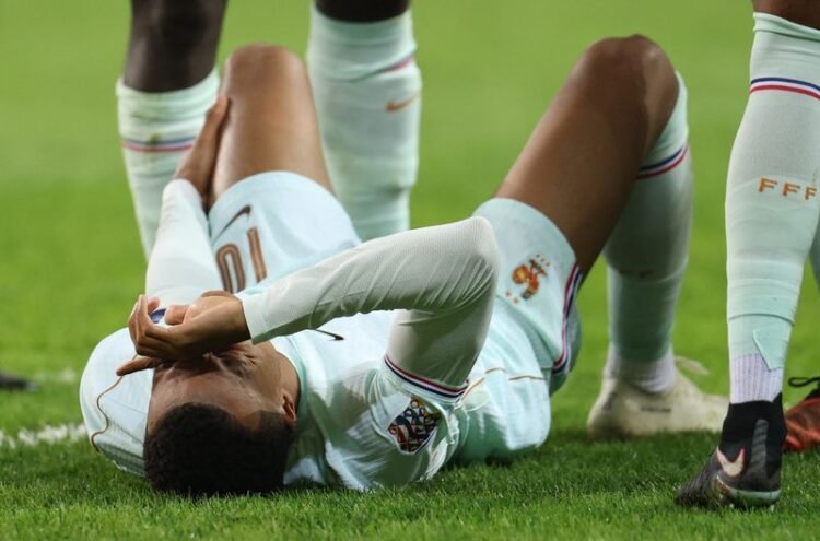 Football: Soccer-Mbappe diagnosed with knee hyperextension, say Real Madrid