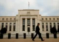 Fed raises interest rates by quarter point to tackle inflation