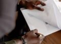 Dennis A Minott | Trustee for, or traitor to, the Jamaican State? | In Focus