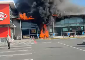 Mobility scooter fire sets supermarket facade alight