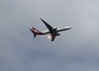 Watch: Passenger plane diverts after flames seen, loud bangs heard from engine