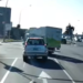 Dashcam shows company truck cutting through traffic at intersection