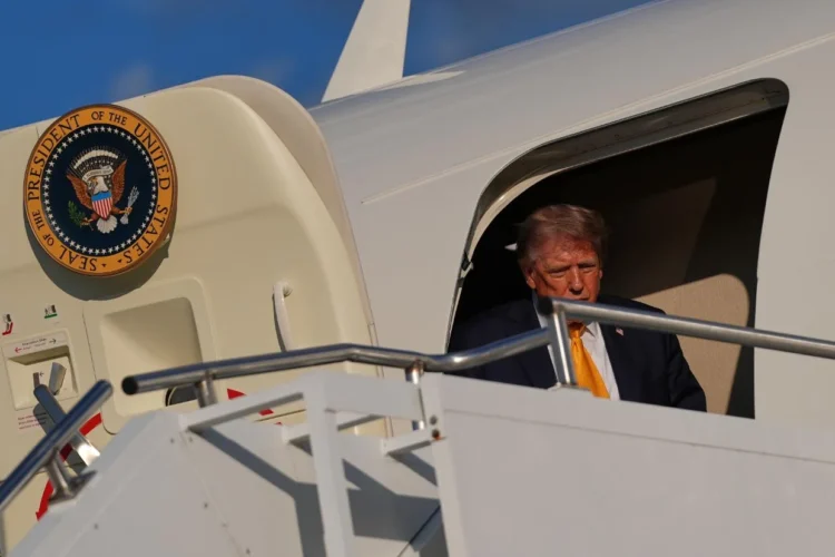 Trump emerges from Air Force One … wait a minute, his hair is brown!