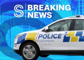 Car and freight train collide in serious crash