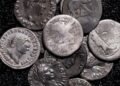 Amateur archaeologist finds Germany’s biggest hoard of ancient Roman silver coins