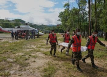 Symbolic funerals held in Nepal for those feared lost as some missing tourists make contact