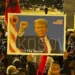 The 15th night of the protest in the square, the portrait of Donald Trump: The Savior is also displayed