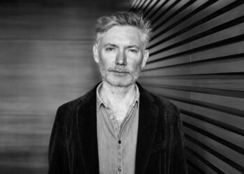 Interview | Director Kevin Macdonald on bringing his documentary instincts to ‘The Runner’ and capturing modern paranoias