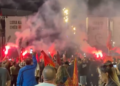 “Not in my name”, protesters light flares under the slogans of “KLA”, thousands of participants