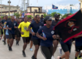 Belize’s Security Forces Carry Flame of Freedom in Inaugural Run