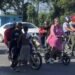 Photo of the day: Children clean windshields in exchange for alms