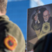 Banner of a protesting citizen: Chief Justice Charles Smith under the silhouette of Albin Kurti, with EU hammer in hand