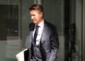 High-flying lawyer goes on trial for writing bad cheque allegedly to cover for collapsing firm