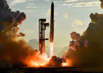 The giant rocket loaded with satellites is sent into orbit around the Earth