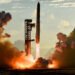 The giant rocket loaded with satellites is sent into orbit around the Earth