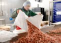 Imports American shrimp to keep production going