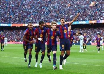 Football: Soccer-Barcelona cruise past Getafe to maintain perfect start