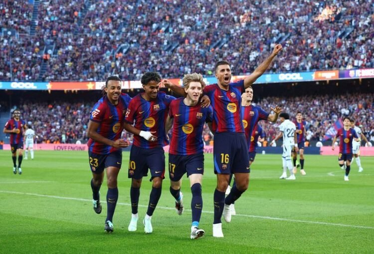 Football: Soccer-Barcelona cruise past Getafe to maintain perfect start