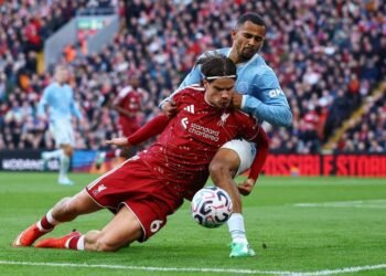 Football: Soccer-Man City silence hostile Anfield with 3-0 win over Liverpool