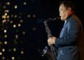 Anutin plays saxophone to welcome IMF and World Bank delegates, promotes Thai culture