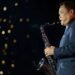 Anutin plays saxophone to welcome IMF and World Bank delegates, promotes Thai culture