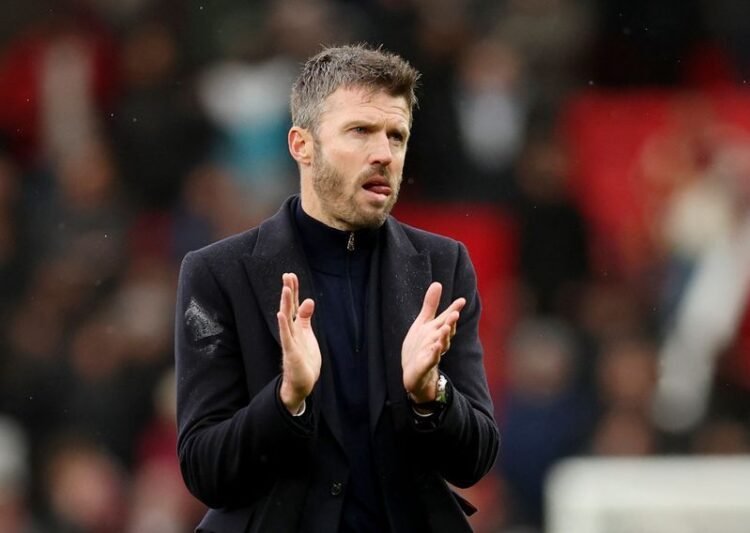 Football: Soccer-Carrick stays on as Man United manager, takes training after crisis talks