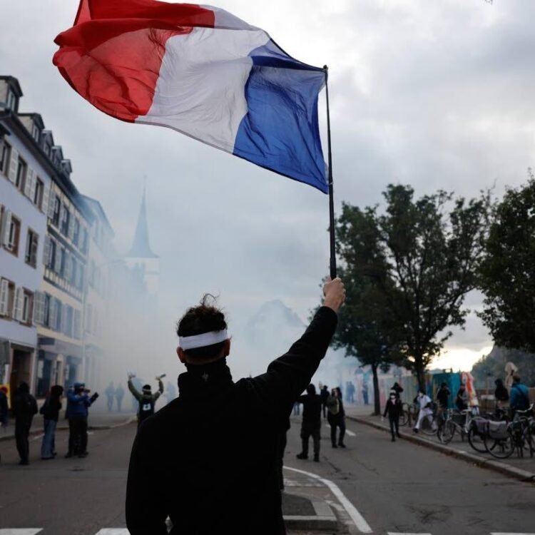 More than 400,000 protest challenging Macron, as clashes erupt in Paris | World News