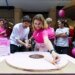 Swiss bakery makes world’s largest pink Carac for breast cancer awareness