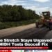 Old Belize Stretch Stays Unpaved for a Year as MIDH Tests Geocell Fix