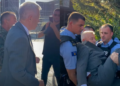 The protestors physically return the LVV MP who tried to leave the Assembly inside the enclosures