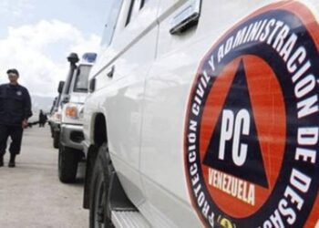They search for two young people missing after a river flood